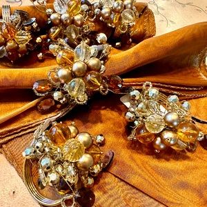 ✨ NWT six bejeweled napkin rings and six metallic bronze napkins from Pier 1.